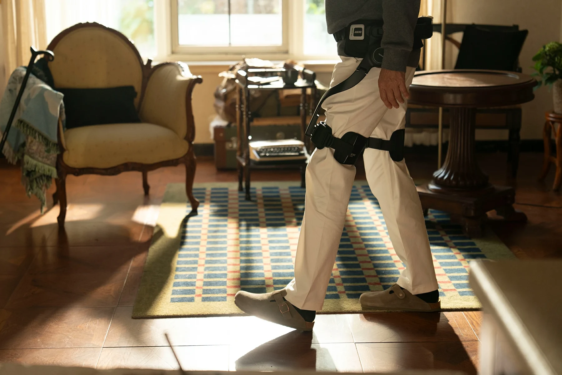 AlpWalk S1 worn while walking indoors